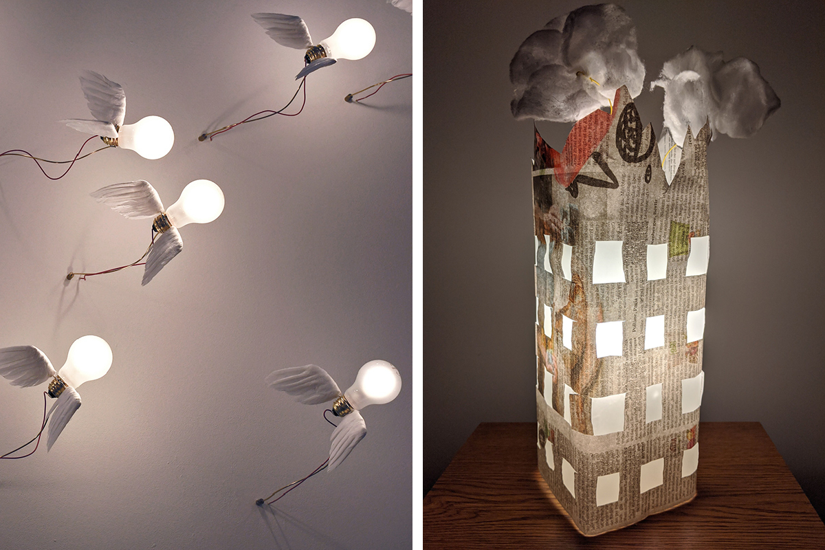 Glühbirnen mit Flügeln von Ingo Maurer und ein als Wolkenkratzer selbstgestaltete Lampenschirm